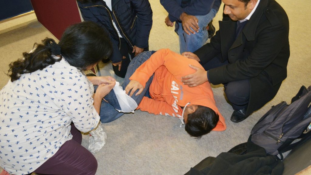 Malaben demonstrated basic first aid on Suraj at the second Oshwal Trekkers meeting!